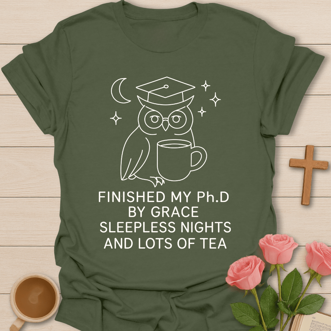 Wise Owl Dissertation Finished shirt with graduate owl, books, graduation cap, and cream lettering. - Military Green