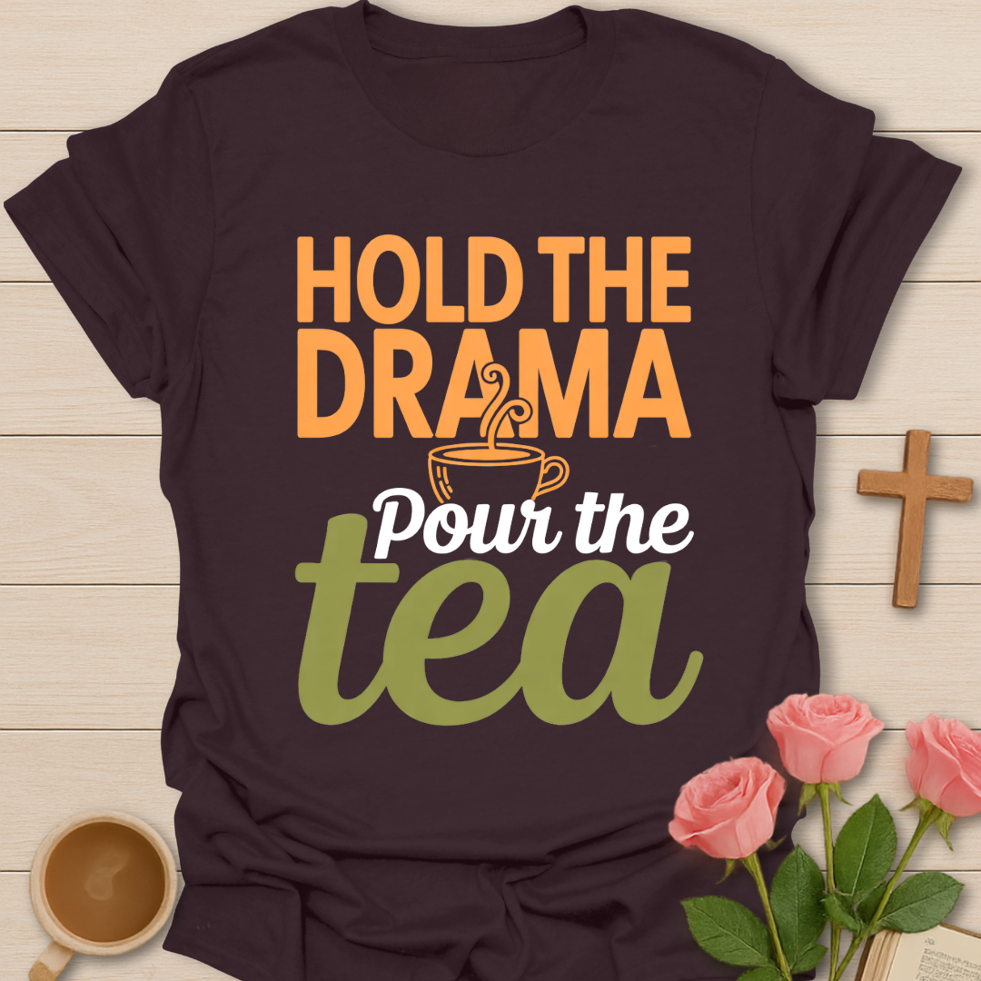 Dark Chocolate t-shirt with typography reading “Hold the Drama, Pour the Tea,” featuring a steaming tea cup illustration in warm, cozy colors.