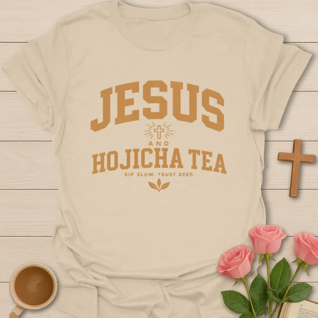 Jesus and Hojicha Tea shirt with varsity lettering, cross, leaves, and Sip Slow Trust Deep phrase. - Sand