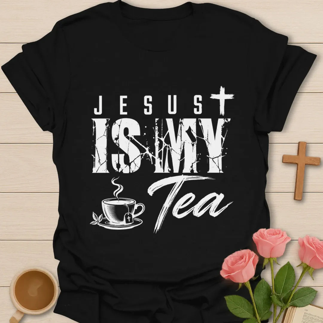 Jesus Is My Tea shirt with bold distressed white lettering, teacup, tea bag, cross, and leaves. - Black