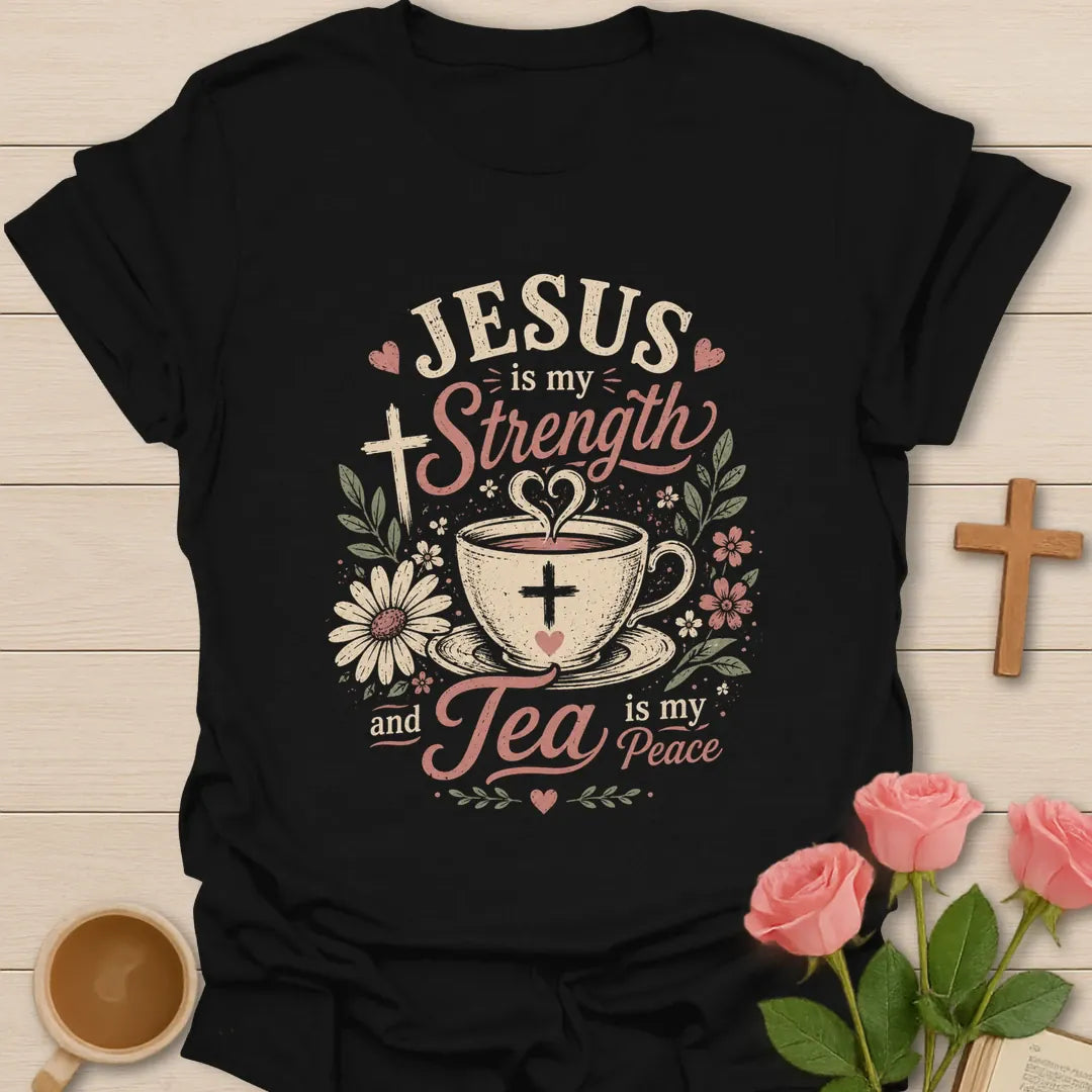 Jesus is my strength and tea is my peace shirt with teacup, cross, flowers, hearts, and soft pink lettering. - Black