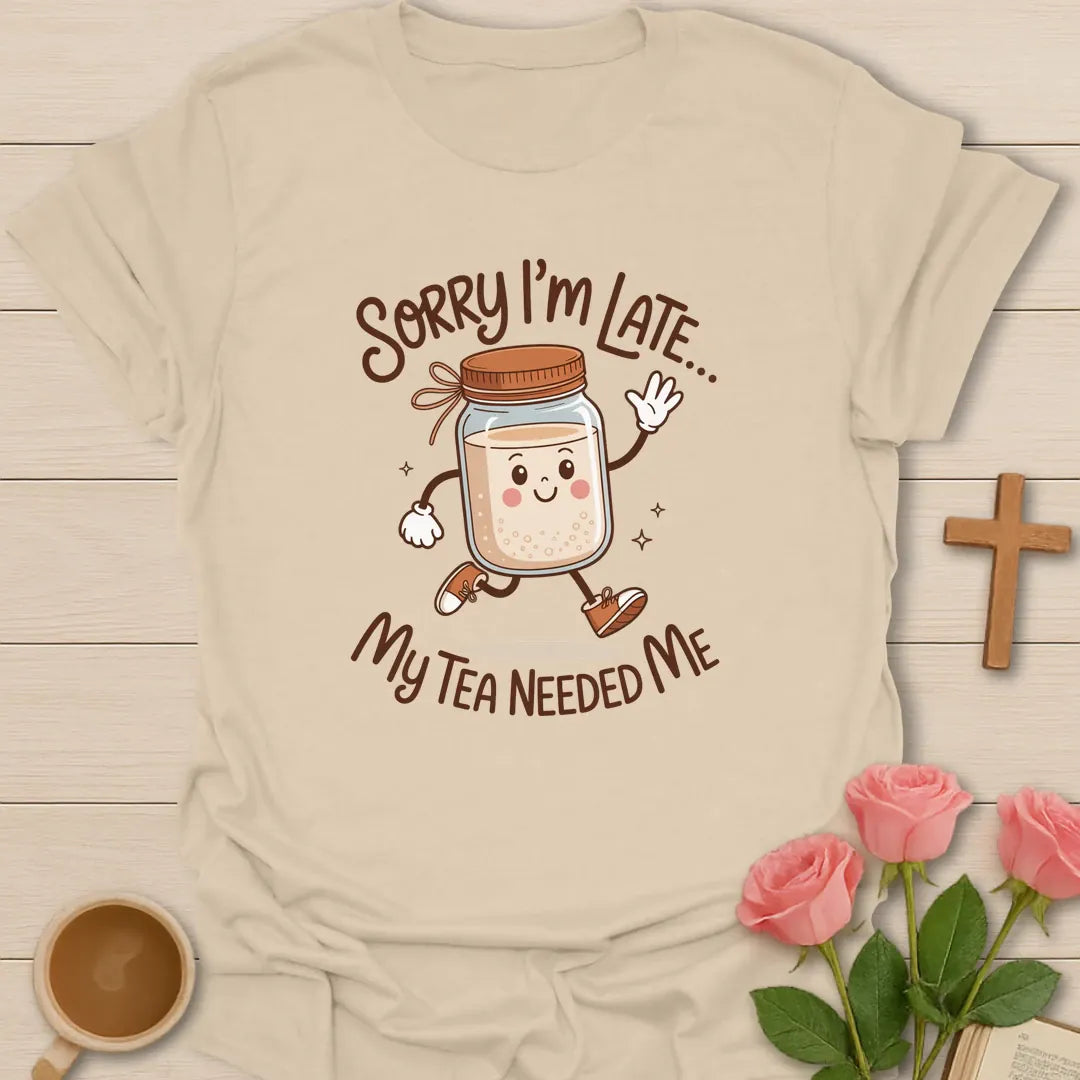 My Tea Needs Me shirt with teacup, playful lettering, and faith-inspired design. - Sand