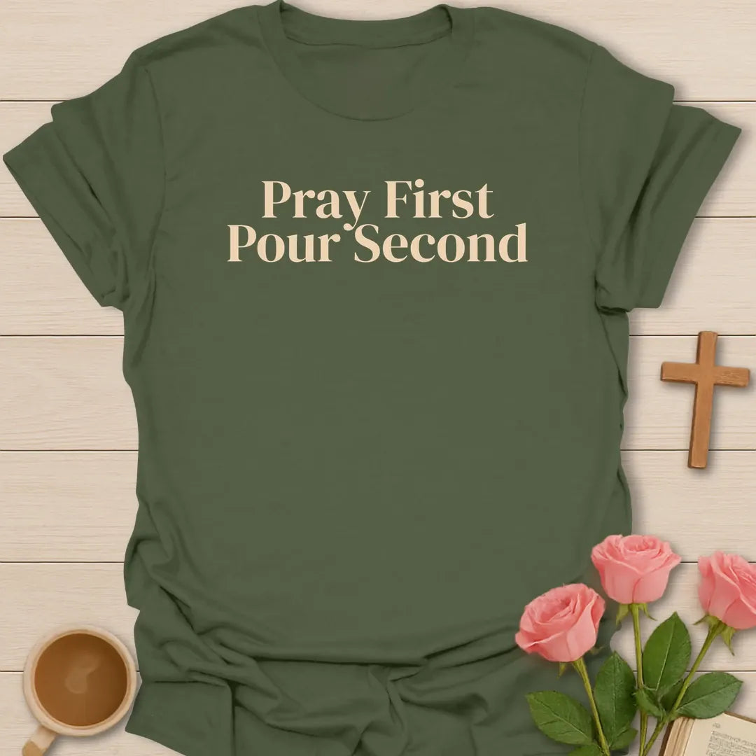 Pray First Pour Second Faith shirt with steaming teacup, cross, and cream vintage lettering. - Military Green