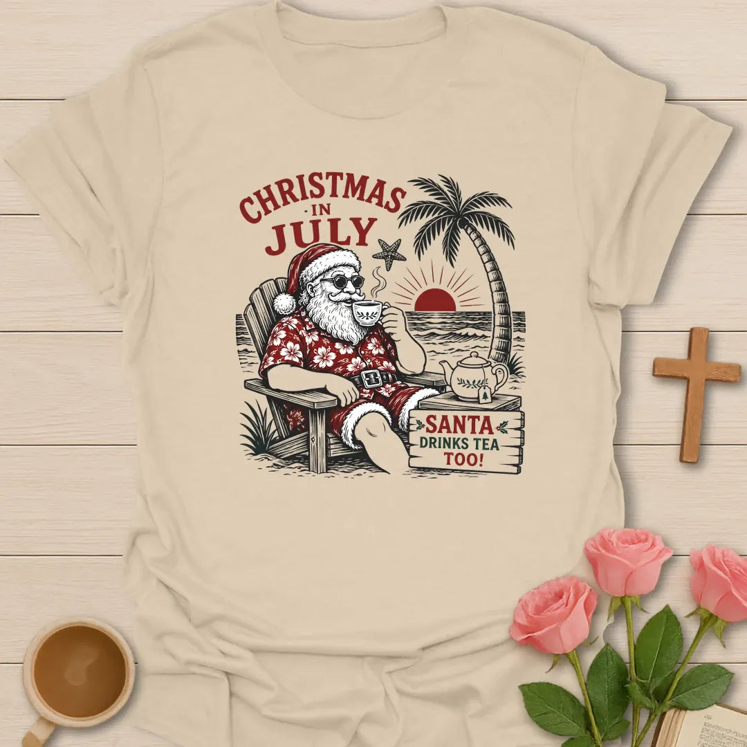 Santa Drinks Tea Too shirt with Santa, teacup, tropical beach accents, and playful Christmas lettering. - Sand