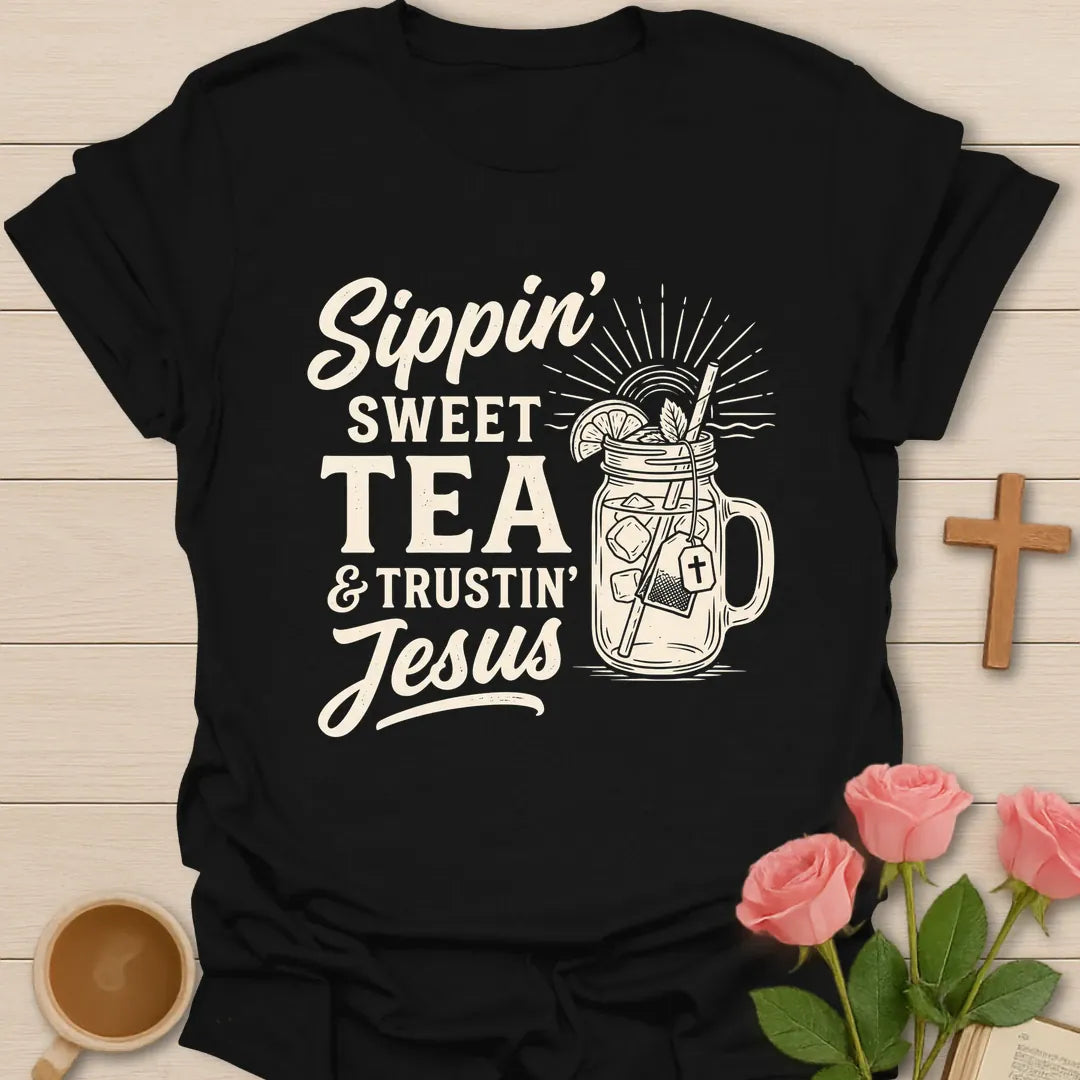 Sippin Sweet Tea and Trustin Jesus shirt with mason jar sweet tea, cross, and cream vintage lettering. - Black