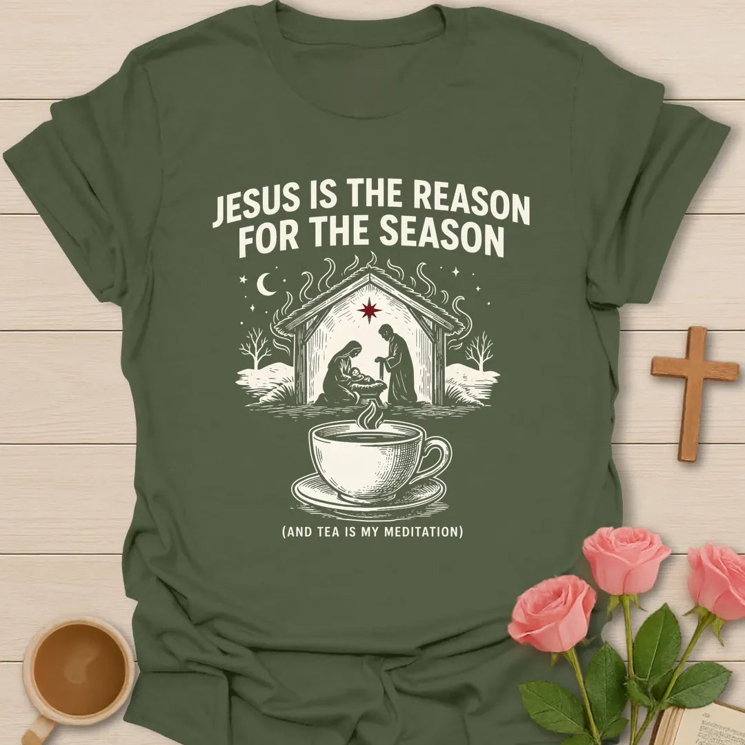 Jesus is the Reason for the Season shirt with nativity scene, steaming teacup, stars, and Christmas faith text. - Military Green