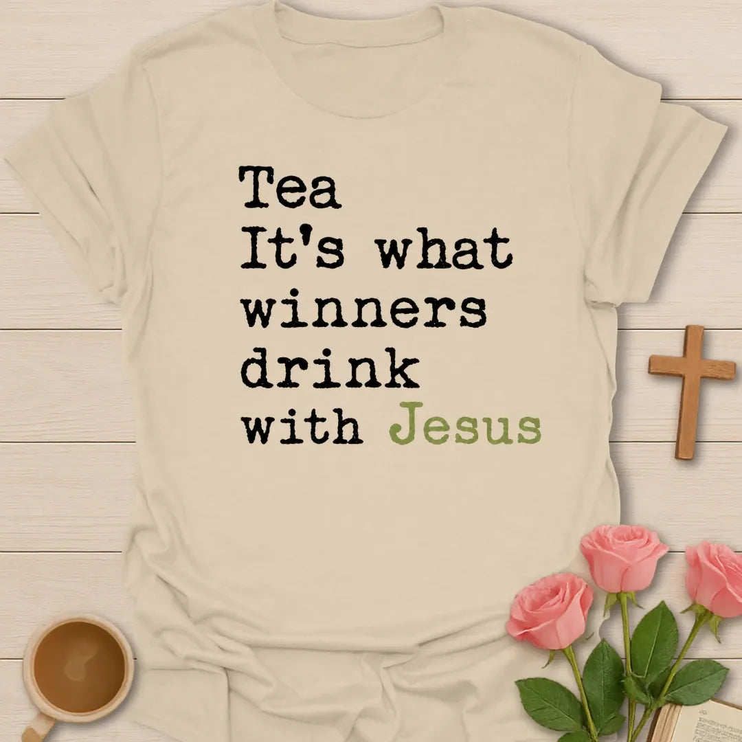 What Winners Drink With Jesus shirt with teacup, cross, and bold vintage lettering. - Sand