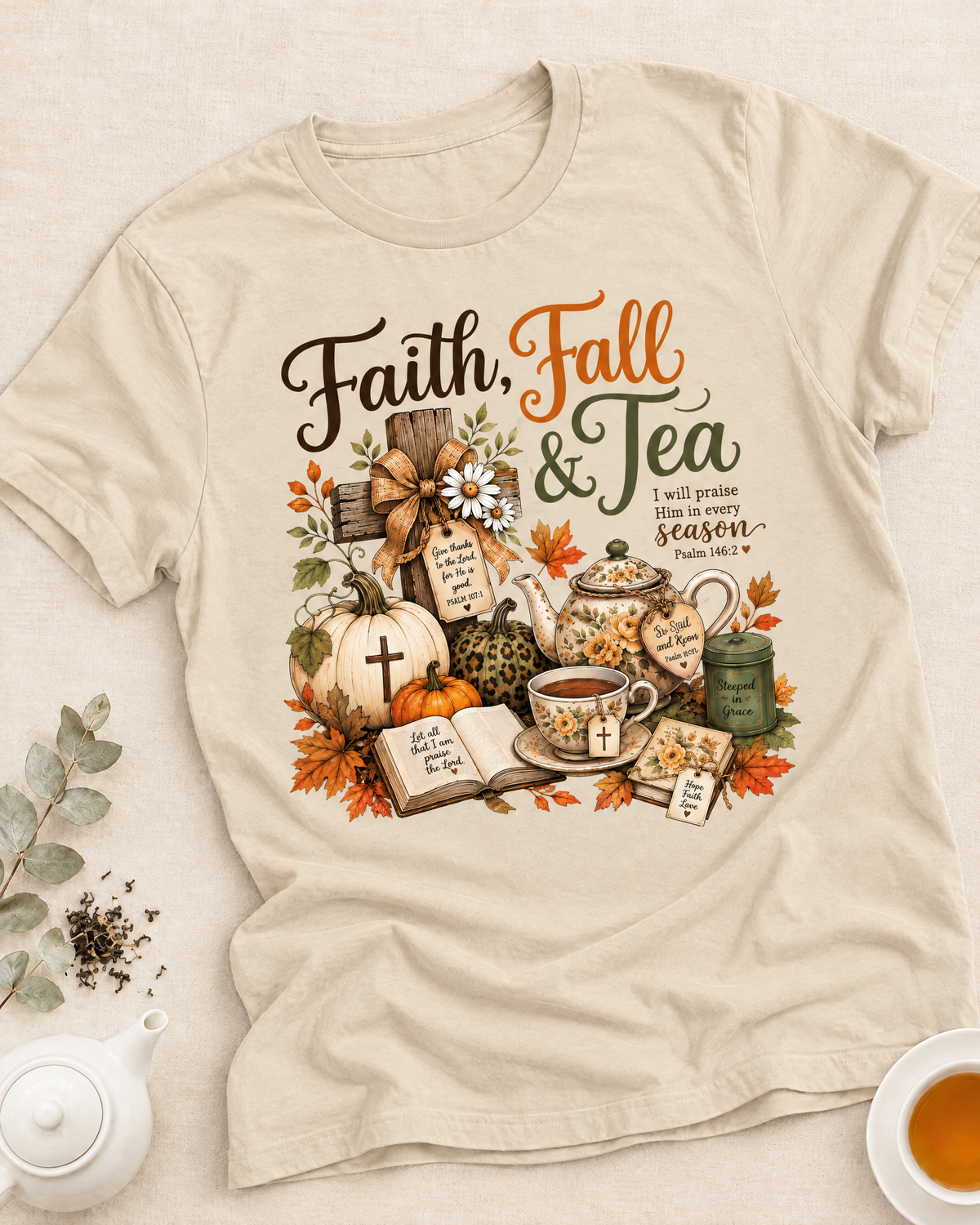 Woman in a Be Still And Know T-shirt and headwrap holding a teacup beside an open book and candle, with Bible Verse & Scripture collection text above.