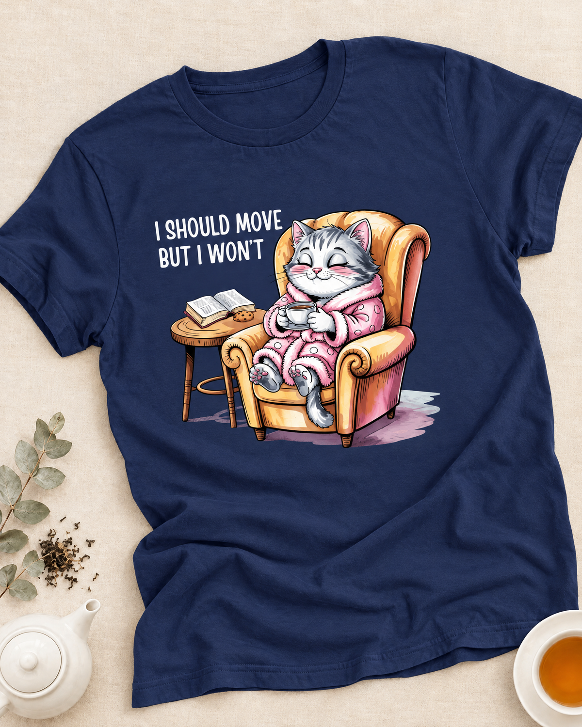 Cheerful woman in a humorous Peaceful Dog Tea T-shirt holding a mug on a cozy sofa with blanket and candle, with Funny Faith + Tea collection text above.