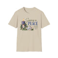 Sipping In Peace Advent Christian tea t-shirt with peaceful lettering and faith-inspired design. - Sand