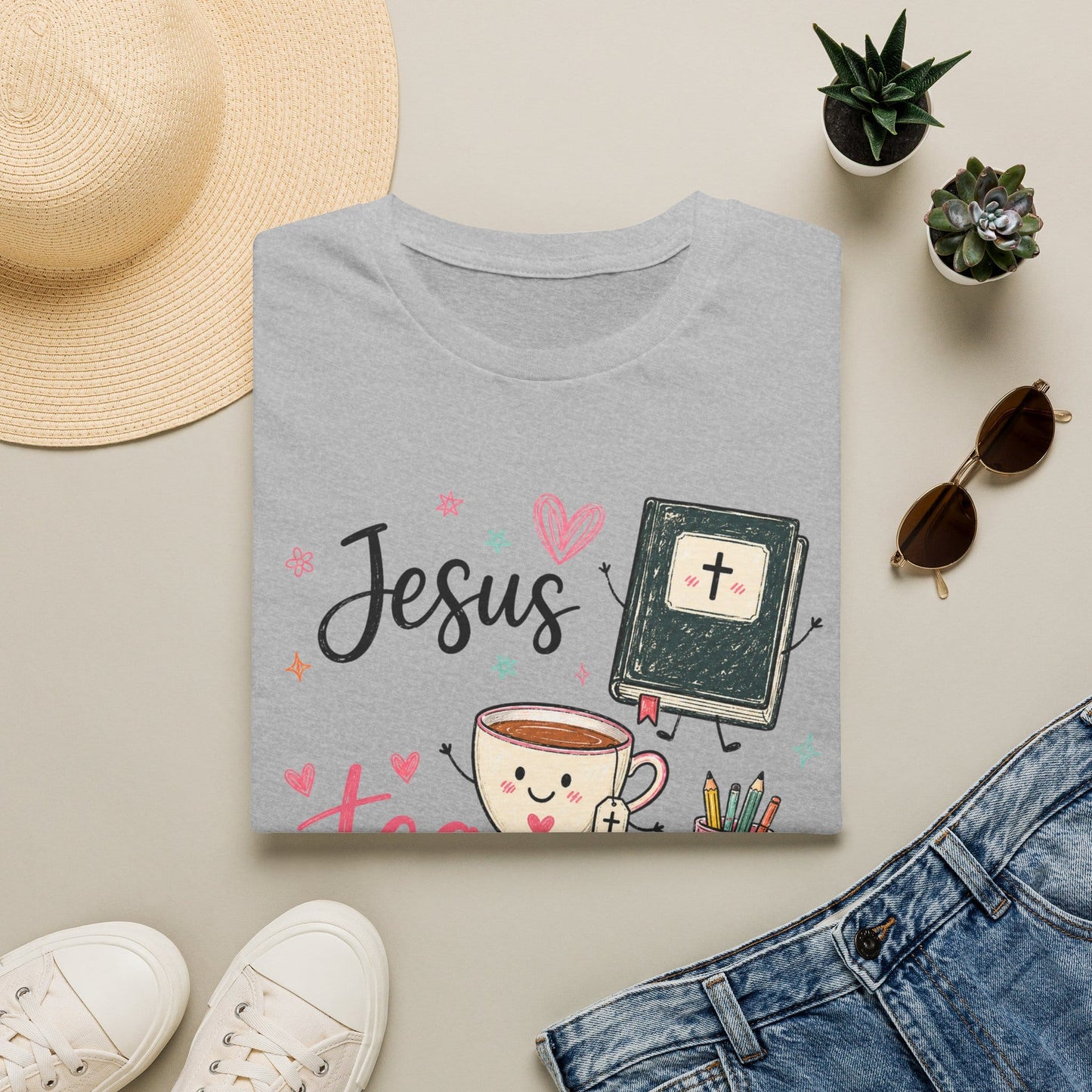 Jesus Tea Teaching shirt with black script text, pink tea lettering, smiling tea cup, Bible, books, pencil cup, stars, hearts, and floral doodles.