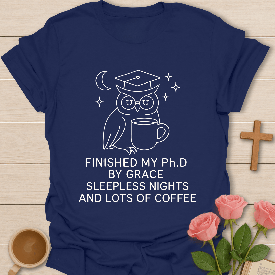 Wise Owl Dissertation Finished shirt with graduate owl, coffee cup, books, and cream lettering. - Navy