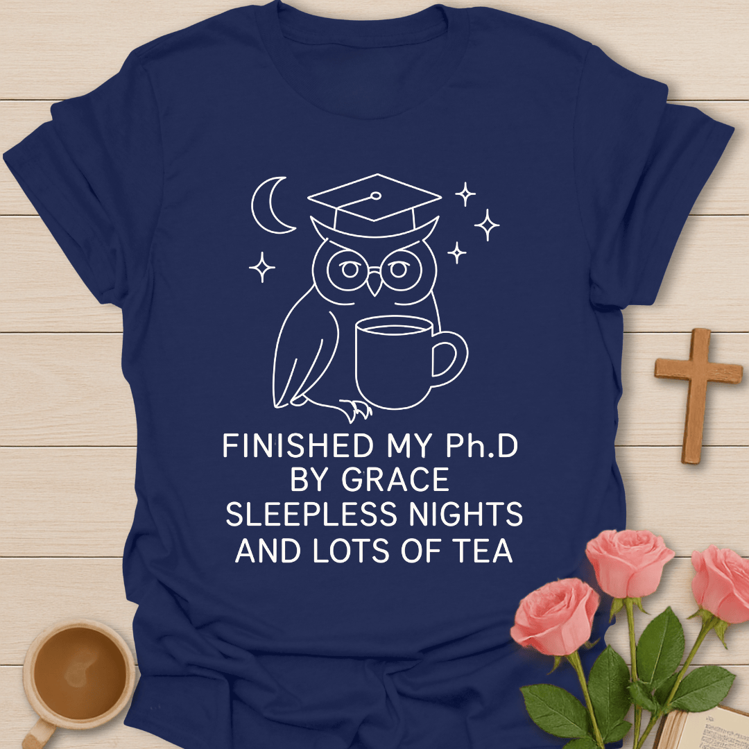 Wise Owl Dissertation Finished shirt with graduate owl, books, graduation cap, and cream lettering. - Navy