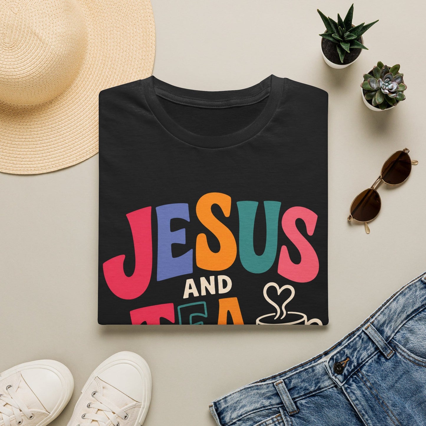 Jesus and Tea shirt with heart artwork and faith-inspired lettering. - Black