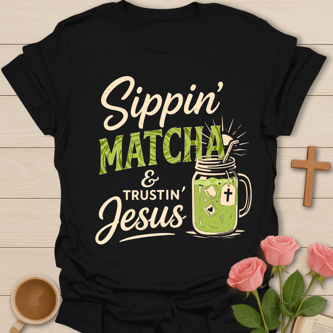 Sippin Matcha and Trustin Jesus shirt with matcha cup, cross, and faith-inspired lettering. - Black