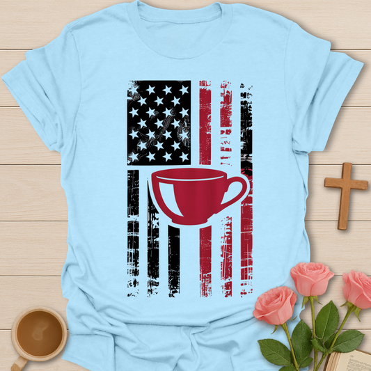 Light blue American flag tea cup graphic shirt featuring a red tea cup over a distressed USA flag design for tea lovers and patriotic faith wear