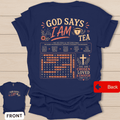 God Says I Am tea shirt with chosen loved enough wording, word search design, cross, hearts, and John 15:16 text.