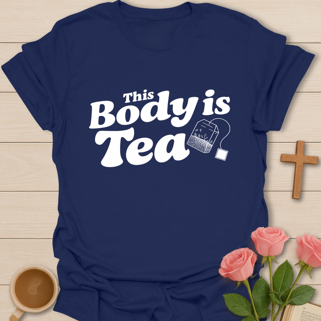 Navy blue graphic t-shirt design with the phrase “This Body Is Tea” and a hanging tea bag illustration