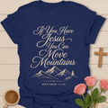 If You Have Jesus You Can Move Mountains shirt with cream script lettering, mountain line art, pine tree, and Matthew 17:20 text. - Navy