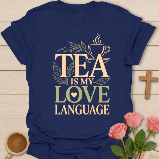 Navy Tea Is My Love Language t-shirt featuring a steaming tea cup, leaves, and warm cozy typography for tea lovers