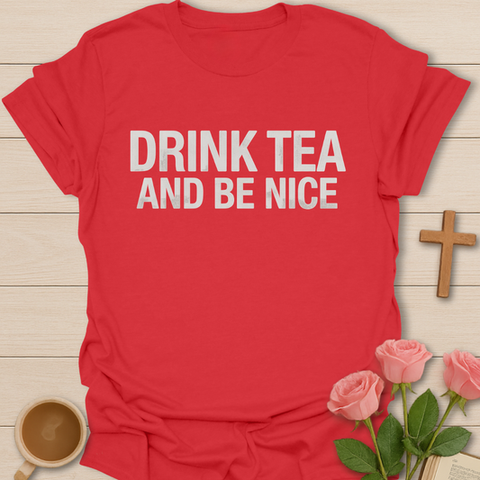 Red Minimalist t-shirt design with bold white text reading “Drink Tea and Be Nice” in a clean modern font.