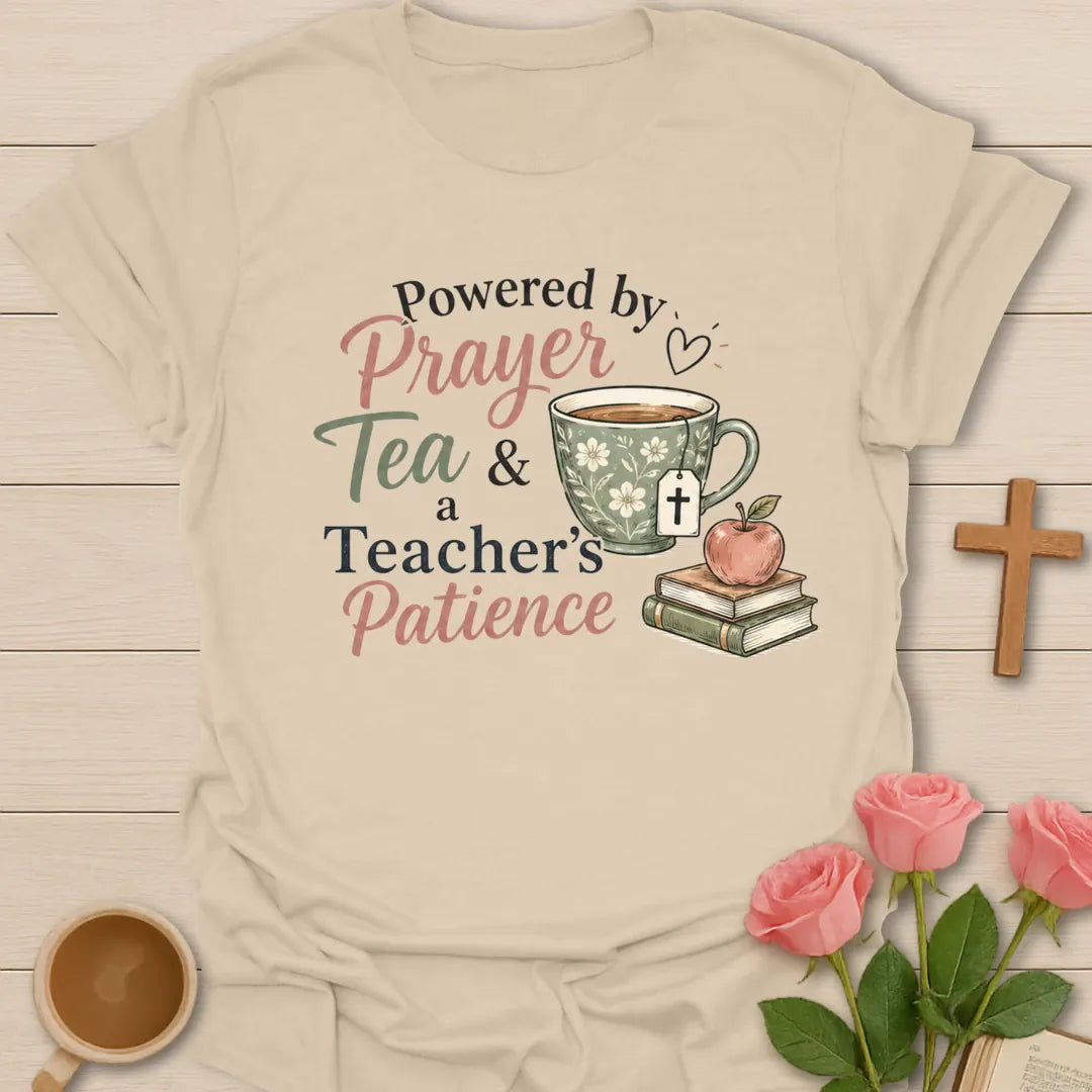 A Teacher's Patience shirt with apple, teacup, cross, and cream vintage lettering. - Sand