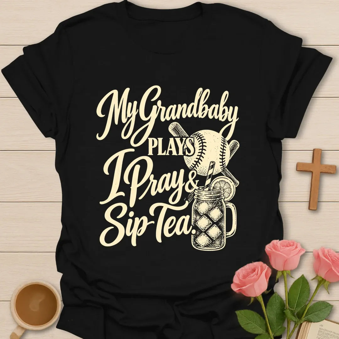 My Grandbaby Plays, I Pray & Sip Tea t-shirt with script lettering, a baseball, crossed bats and an iced tea mason jar - Black