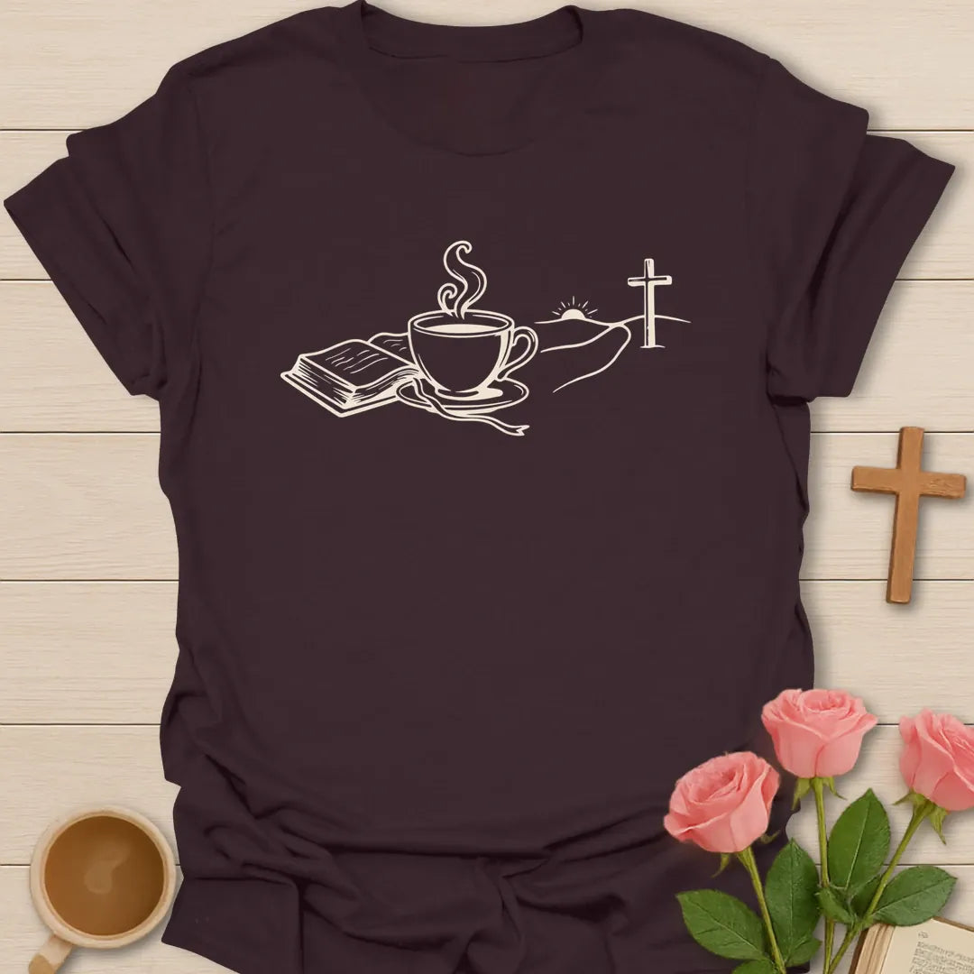 Minimalist line art Christian t-shirt with an open Bible, steaming teacup and a cross on a sunrise hill - Dark Chocolate