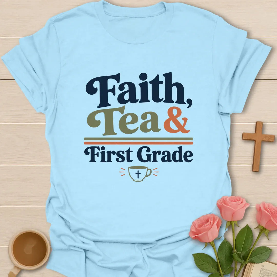 Faith Tea and First Grade shirt with navy, sage, and coral typography, double divider lines, and small teacup with cross. - Light Blue