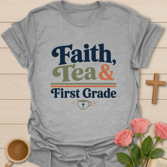 Faith Tea and First Grade shirt with navy, sage, and coral typography, double divider lines, and small teacup with cross. - Sport Grey