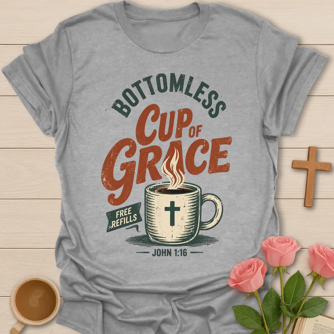 Bottomless Cup of Grace vintage Christian t-shirt with a steaming mug marked with a cross, a Free Refills banner and John 1:16 - Sport Grey