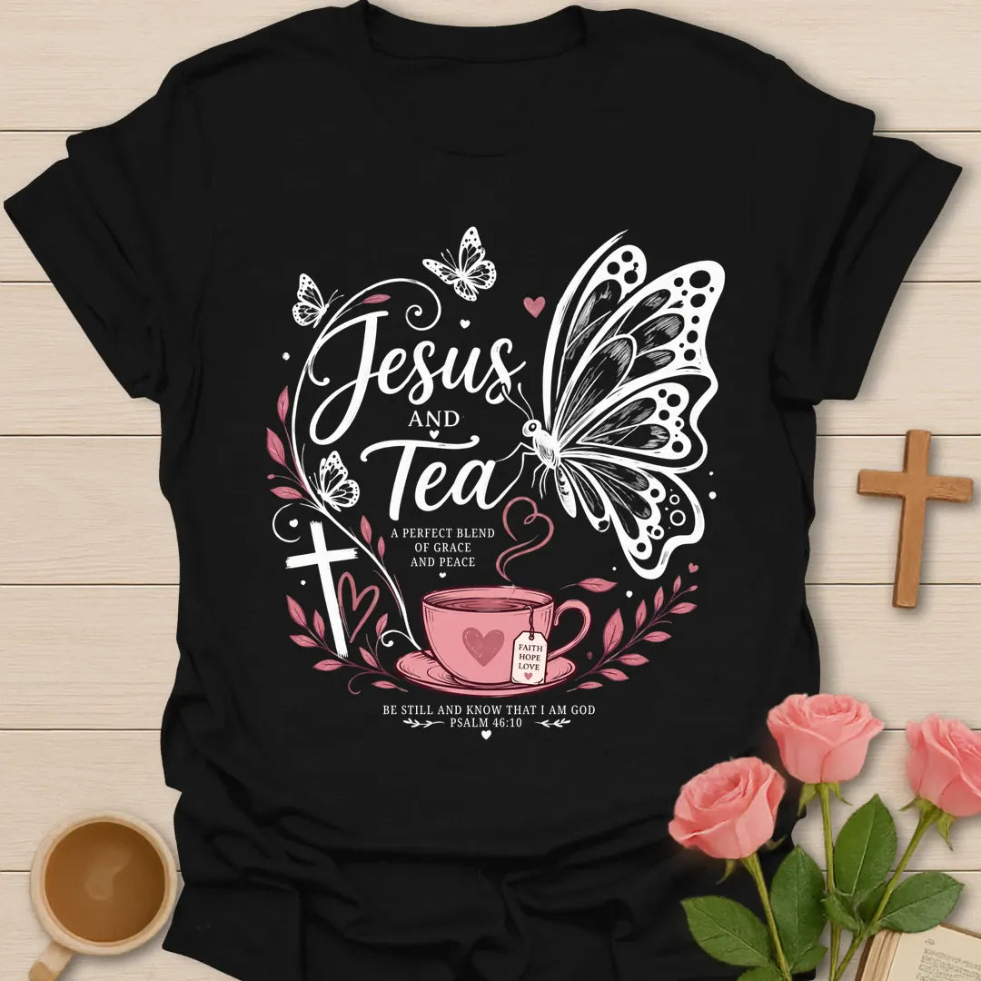 Butterfly Jesus and Tea shirt with pink teacup, butterfly, cross, hearts, leaves, and Psalm 46:10 text. - Black