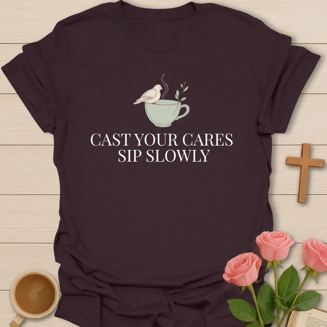 Cast Your Cares Sip Slowly minimalist Christian t-shirt with a white dove perched on a steaming sage teacup - Dark Chocolate