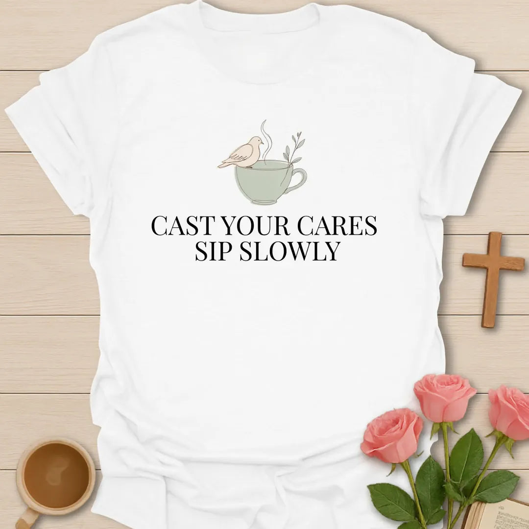 Cast Your Cares Sip Slowly minimalist Christian t-shirt with a white dove perched on a steaming sage teacup - White
