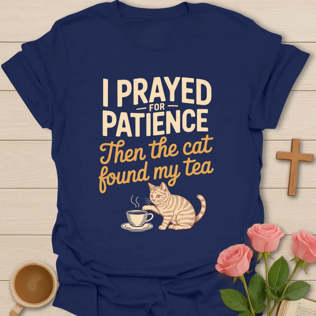 I Prayed for Patience Then the Cat Found My Tea funny Christian t-shirt with an orange tabby cat reaching for a teacup - Navy