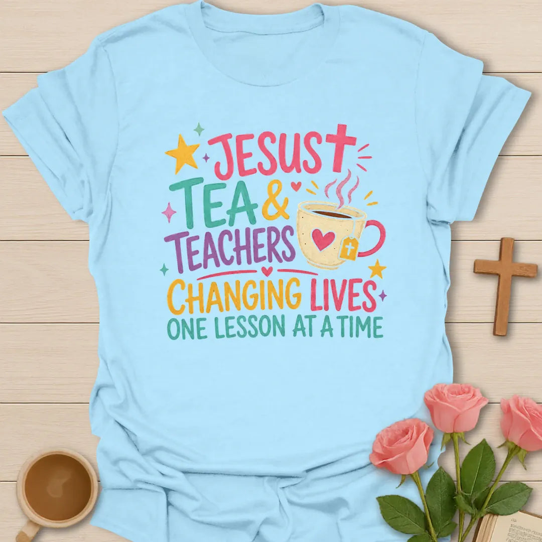 Jesus Tea and Teachers Changing Lives shirt with colorful lettering, teacup, cross tea tag, hearts, stars, and playful classroom style. - Light Blue