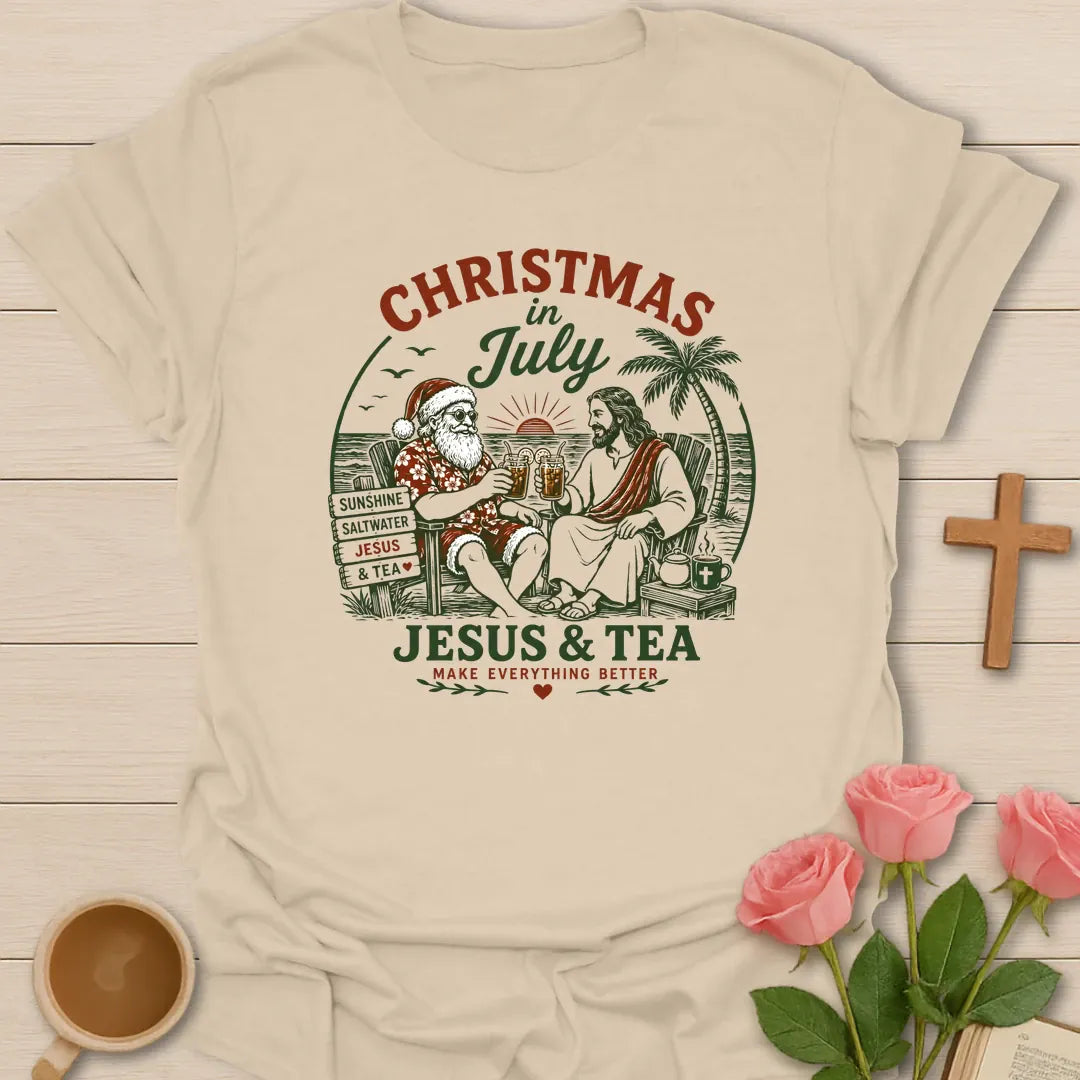 Christmas in July Christian shirt with tropical beach scene, palm trees, cross, and festive summer holiday design. - Sand