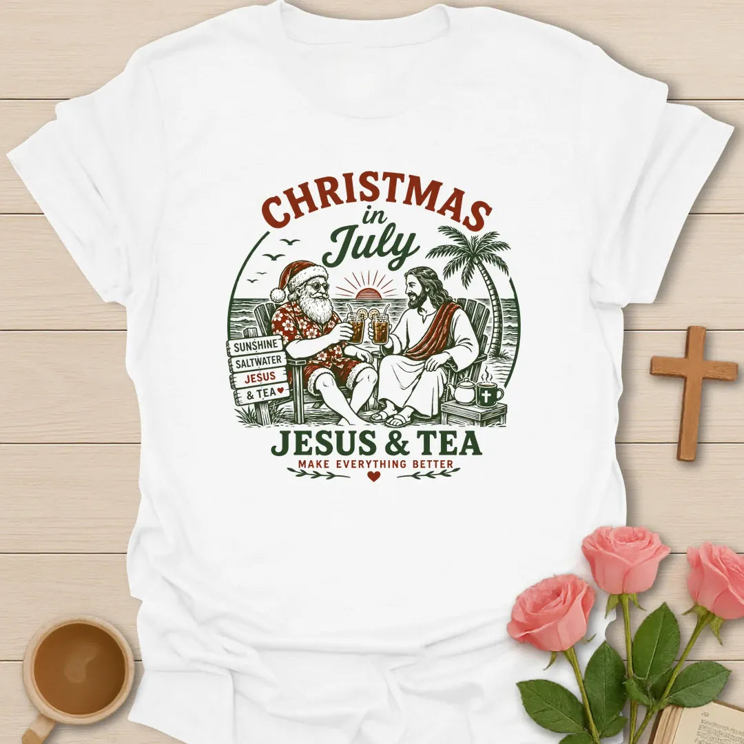 Christmas in July Christian shirt with tropical beach scene, palm trees, cross, and festive summer holiday design. - White