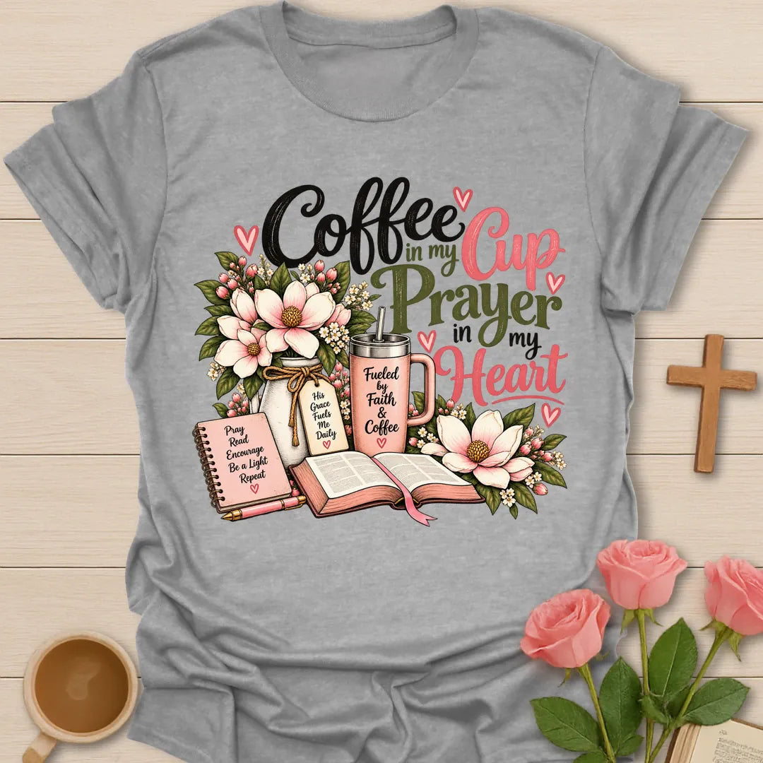Coffee In My Cup, Prayer In My Heart Christian t-shirt with pink flowers, an open Bible, a prayer journal, and a coffee tumbler - Sport Grey