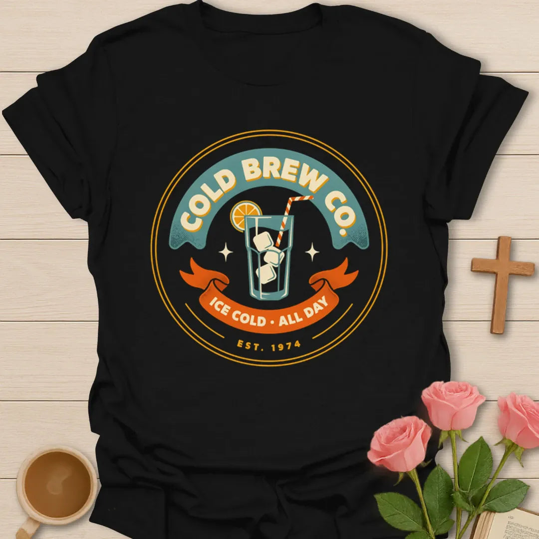 Cold Brew Co iced tea shirt with vintage badge, iced drink, orange slice, straw, stars, and Ice Cold All Day text - Black