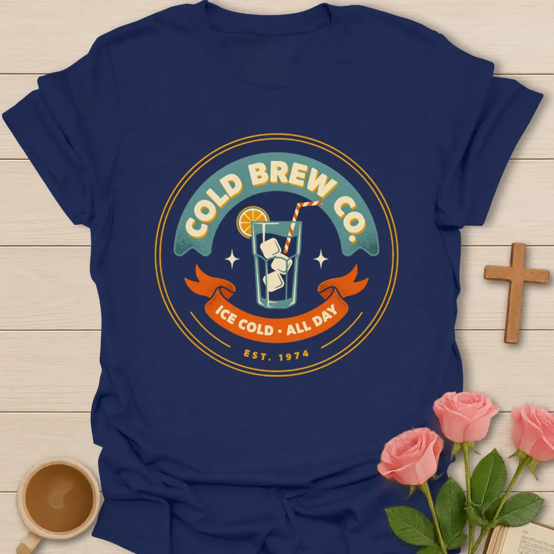 Cold Brew Co iced tea shirt with vintage badge, iced drink, orange slice, straw, stars, and Ice Cold All Day text - Navy