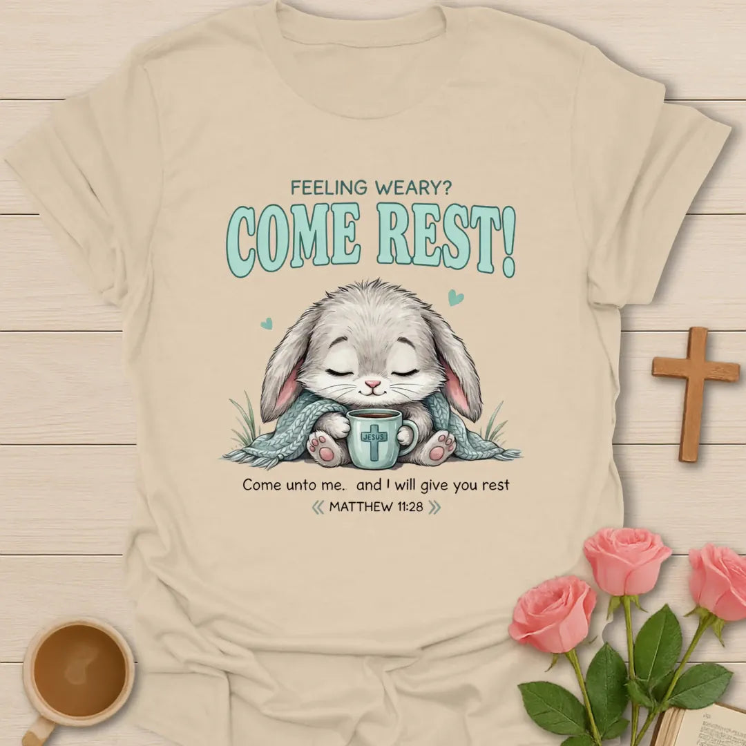 Come Rest Bunny Christian t-shirt with faith-inspired tea lettering design - Sand