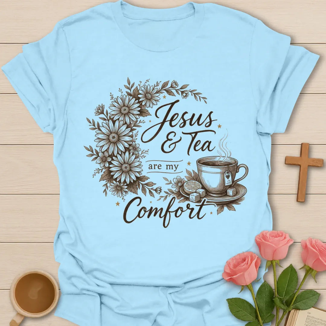 Comforting Jesus and Tea shirt with floral design, teacup, cross, faith lettering, and peaceful Christian artwork. - Light Blue