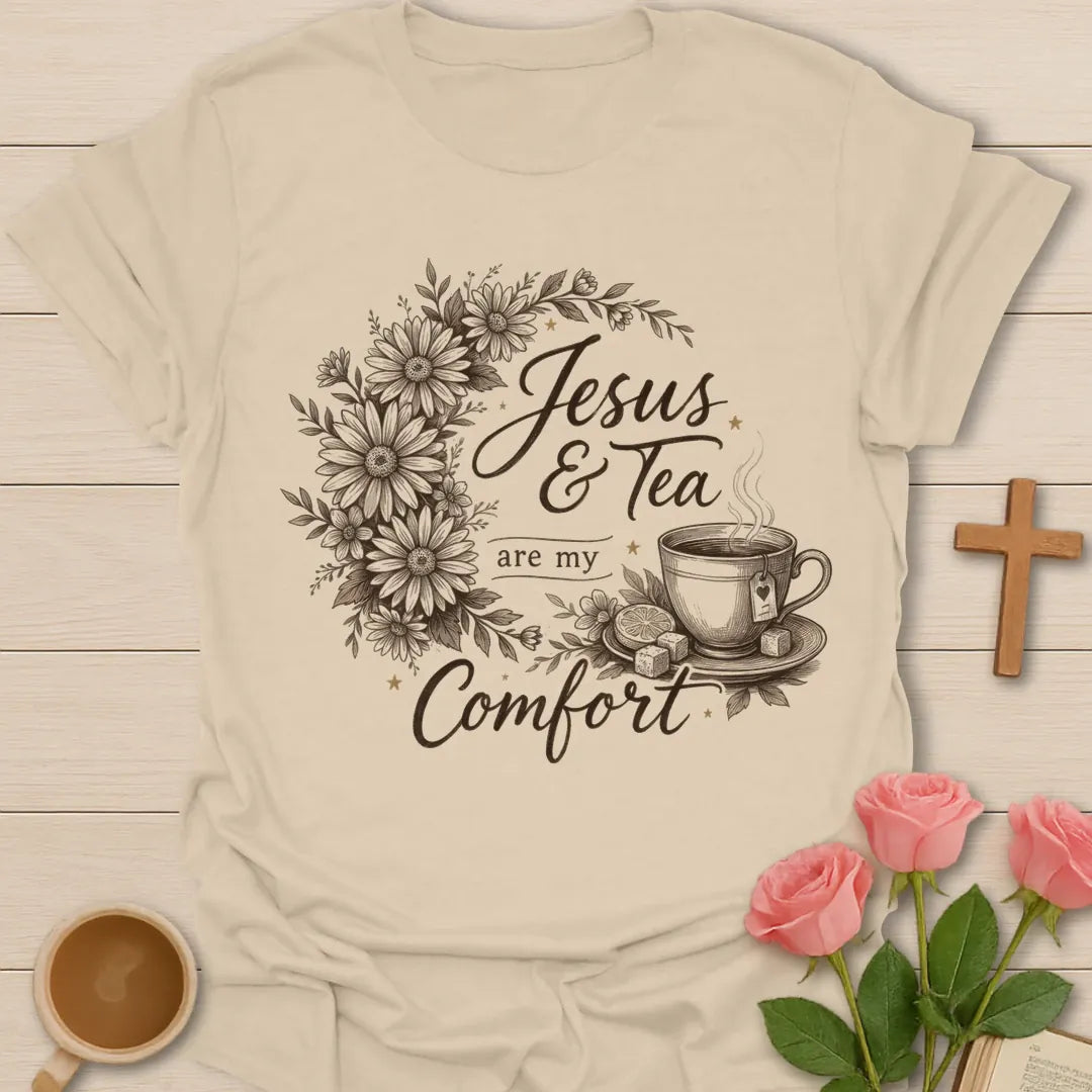 Comforting Jesus and Tea shirt with floral design, teacup, cross, faith lettering, and peaceful Christian artwork. - Sand