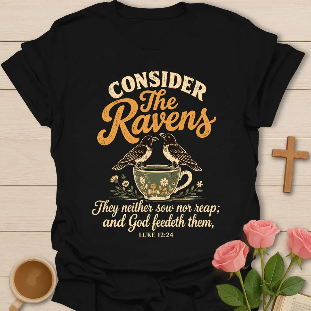 Consider the Ravens Christian t-shirt with two ravens perched on a floral teacup and the words They neither sow nor reap and God feedeth them, Luke 12:24 - Black