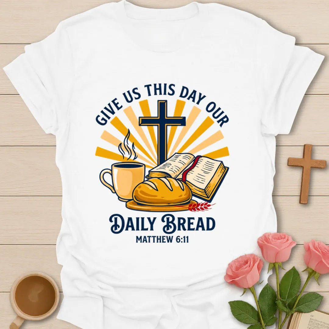 Daily Bread Christian shirt with open Bible, bread, cross, sun rays, and coffee cup. - White