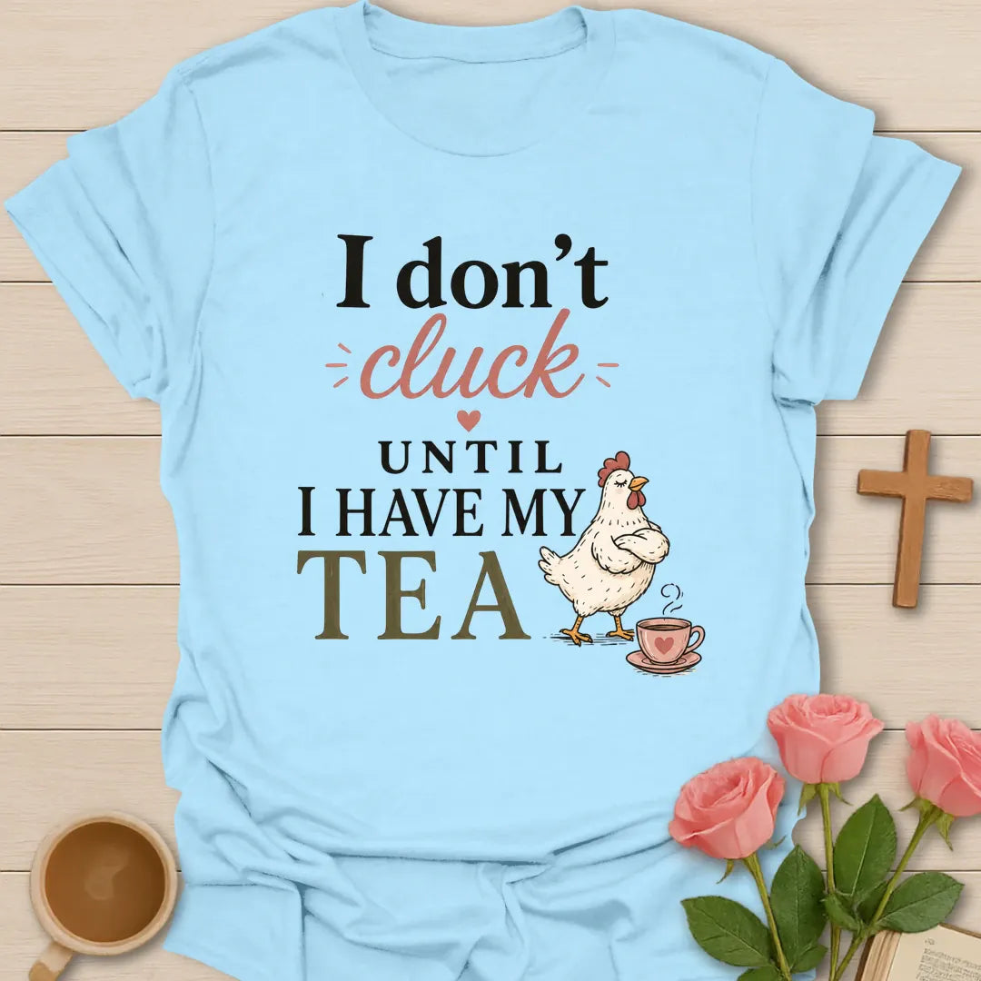 Don't Cluck Without Tea shirt with cute chicken, teacup, and playful lettering. - Light Blue