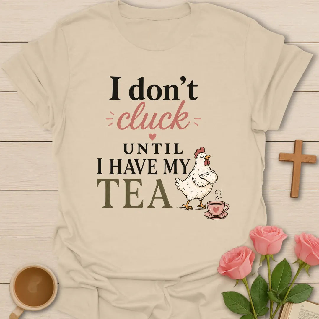 Don't Cluck Without Tea shirt with cute chicken, teacup, and playful lettering. - Sand