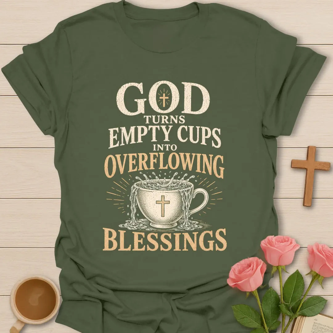 God Turns Empty Cups Into Overflowing Blessings t-shirt with vintage lettering and an overflowing teacup marked with a cross. - Military Green