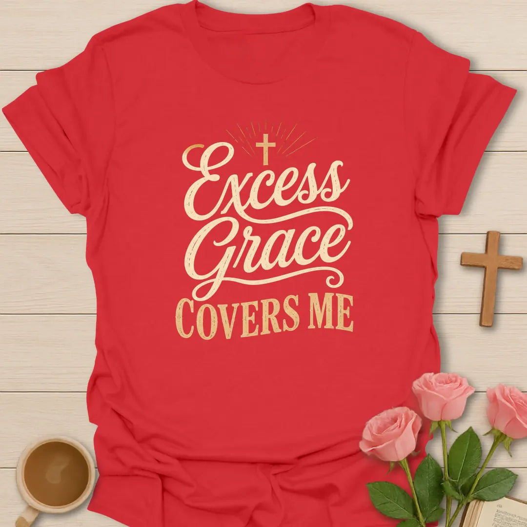 Excess Grace Covers Me shirt with cream script lettering, cross, sun rays, and vintage distressed typography. - Red